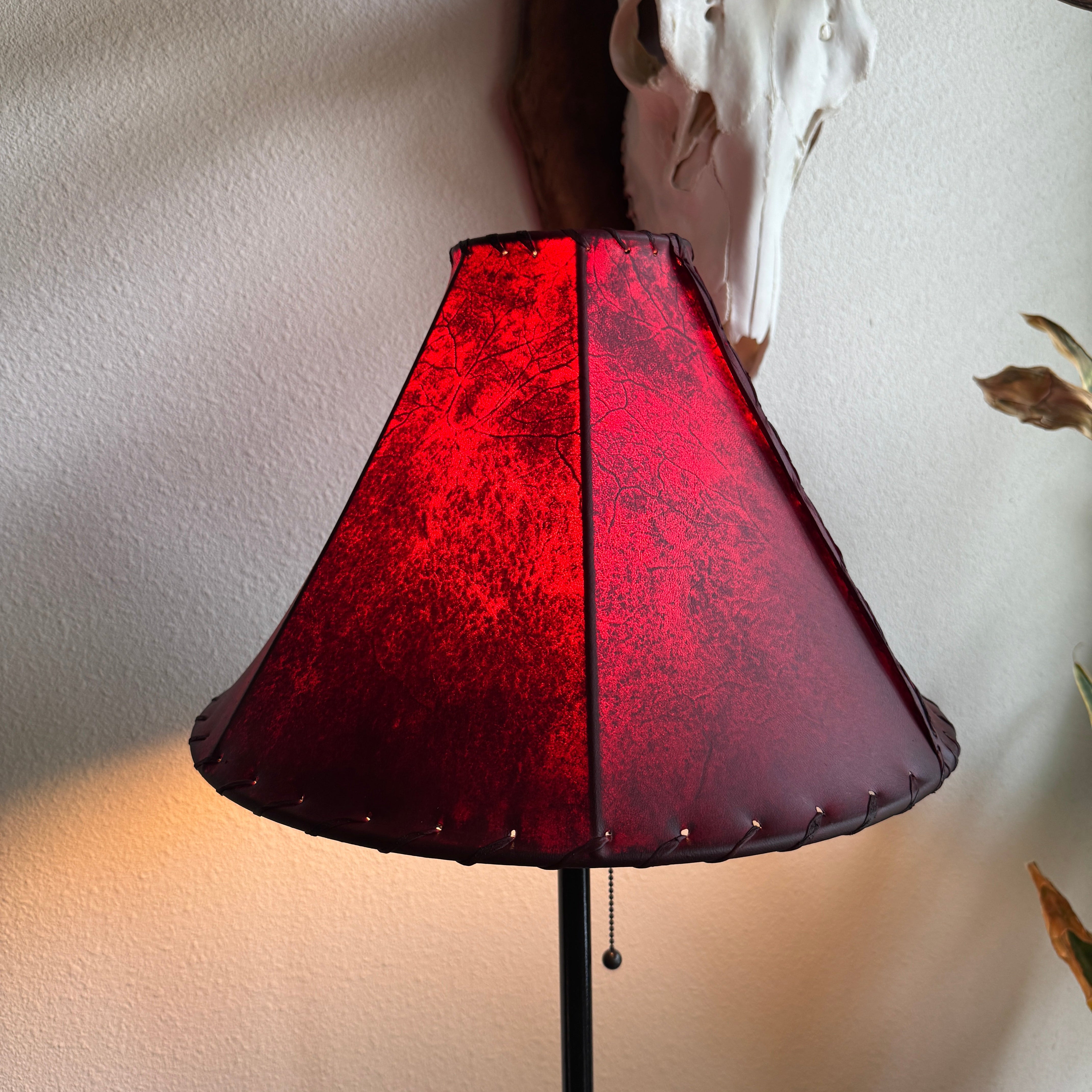 Handcrafted Red Rawhide Western Lamp Shade with light on