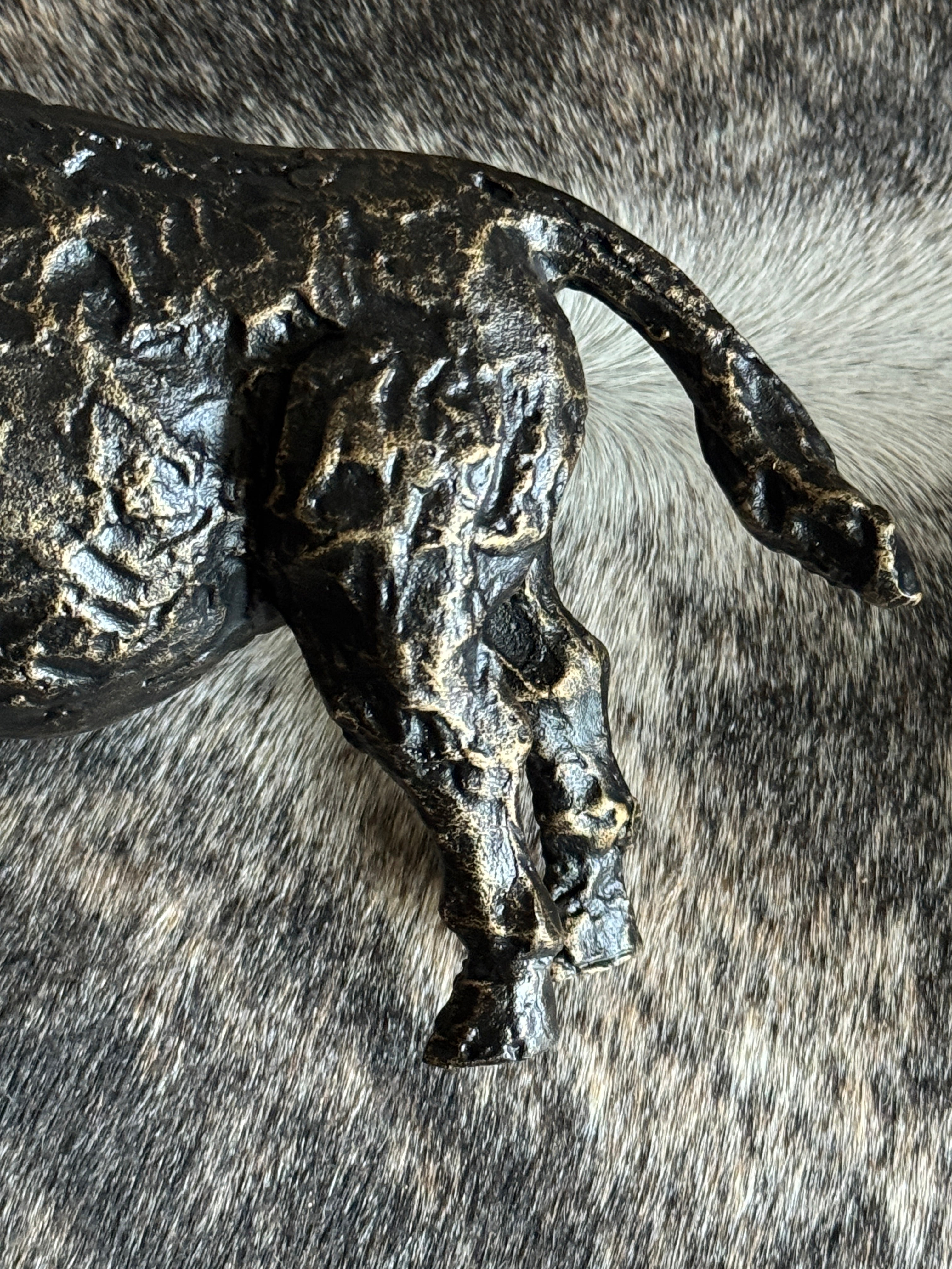 Close up detail of buffalo sculpture shelf decor western home