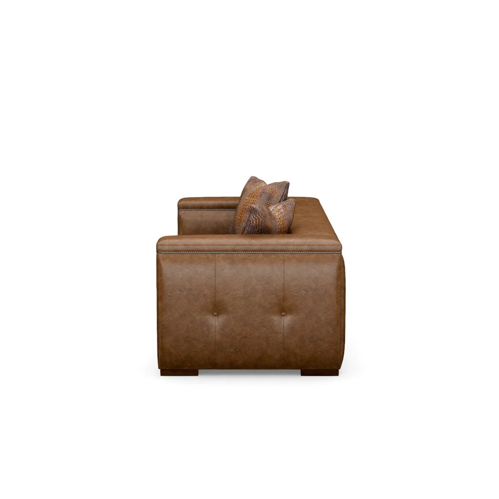 Brown leather armchair with a pillow on a white background - Your Western Decor