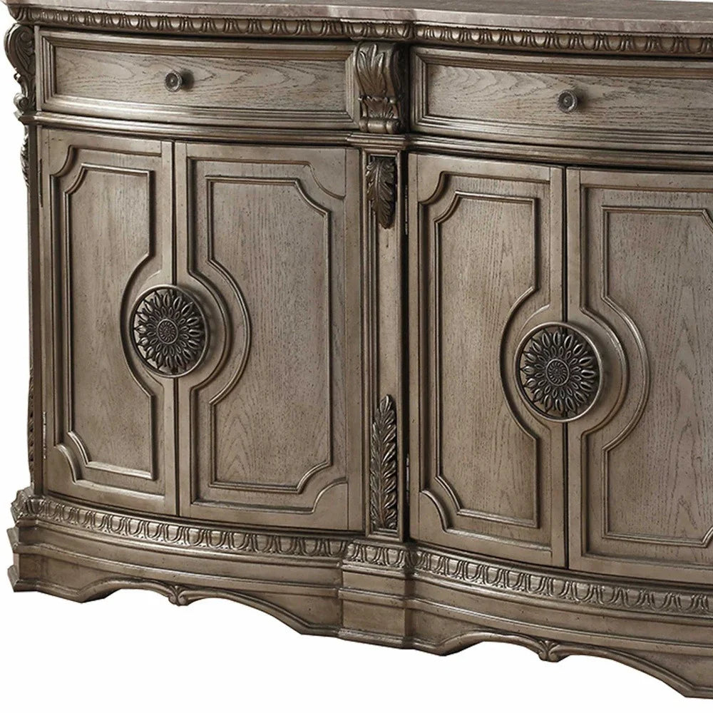 Wooden cabinet with decorative panels and intricate carvings on a white background - Your Western Decor