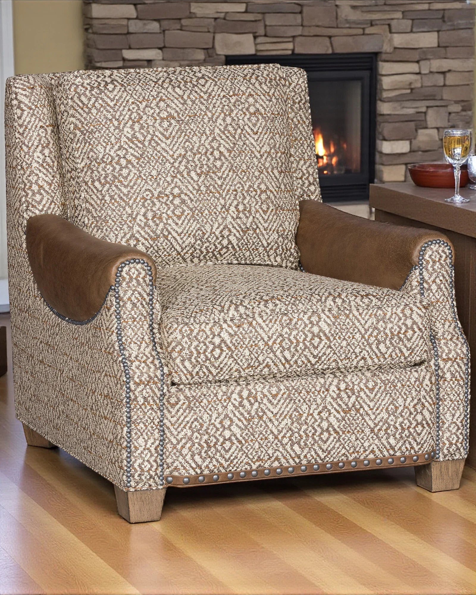 Patterned brown and cream armchair with leather arms - Your Western Decor