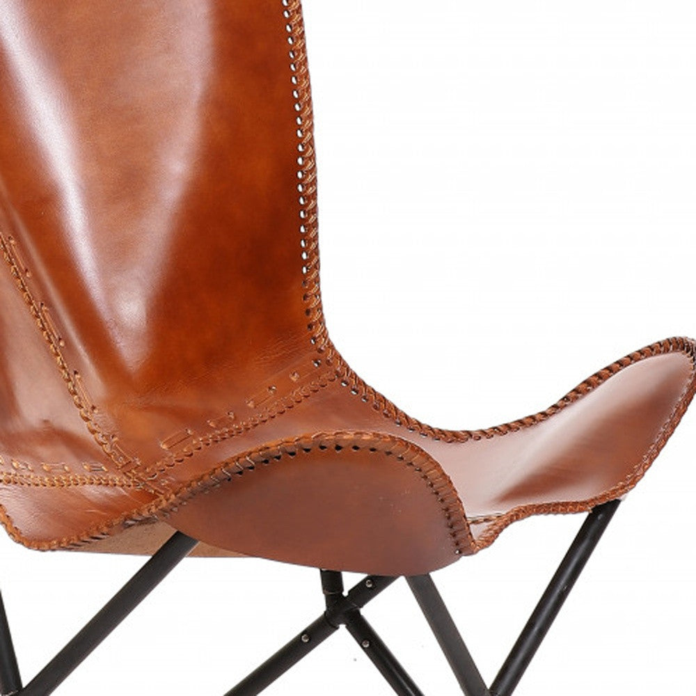 Brown leather butterfly chair detail Your Western Decor