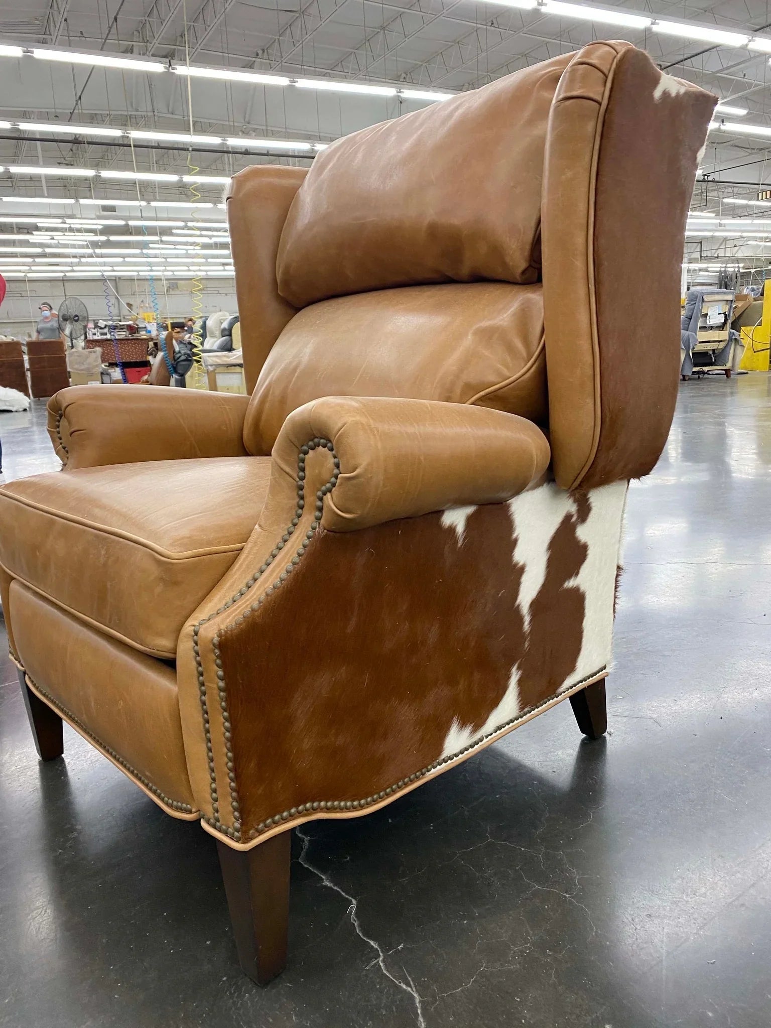 Recliner in tan leather and brown and white cowhide made in the USA - Your Western Decor