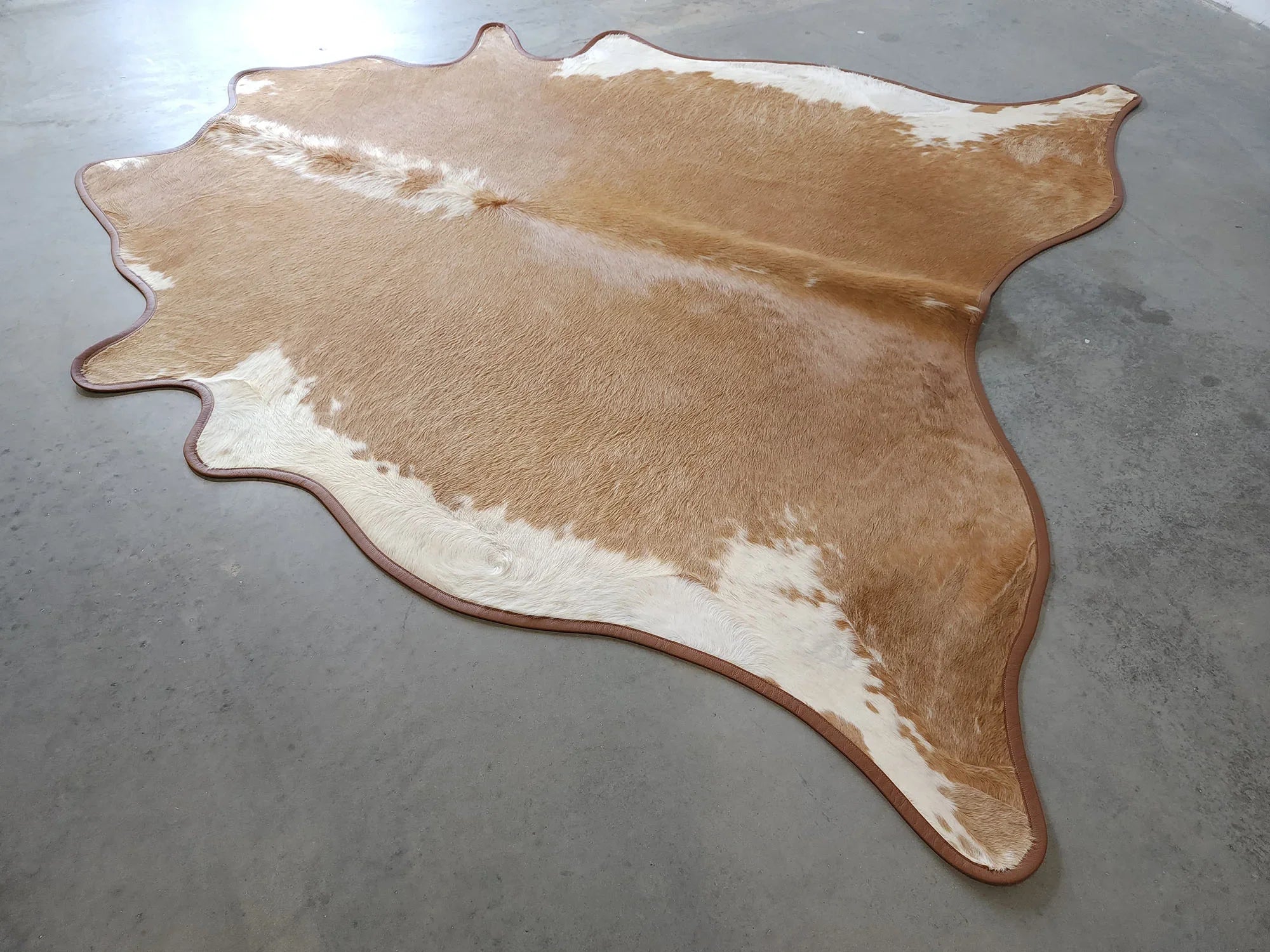 Leather Trimmed Beige and white cowhide rug - Your Western Decor