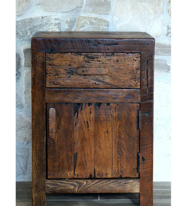 Wooden cabinet with a single drawer and a door against a stone wall background - Your Western Decor