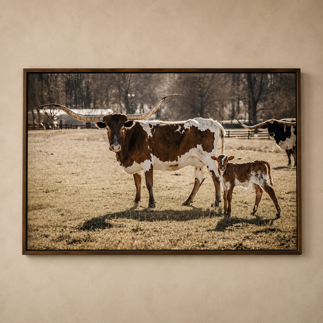 Longhorn Life Canvas Art featuring a Texas Longhorn cow and calf in a peaceful ranch pasture with walnut wood floater frame.