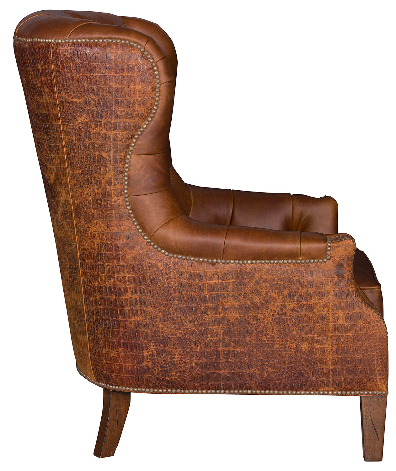 Brown tufted leather wingback chair with embossed leather sides