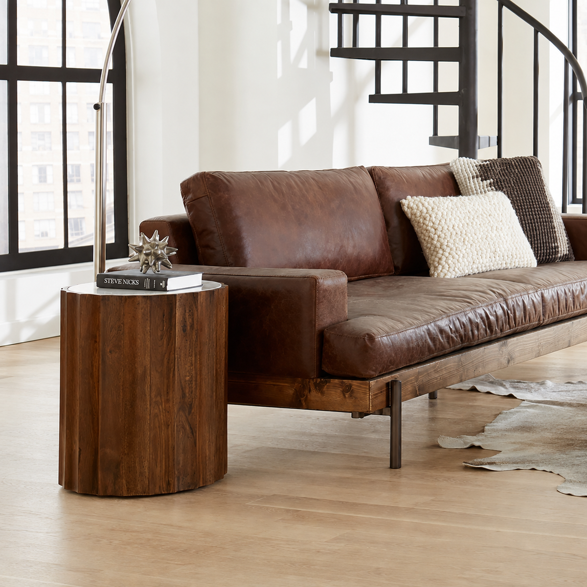 Mango wood marble side and cocktail tables in a modern rustic living room