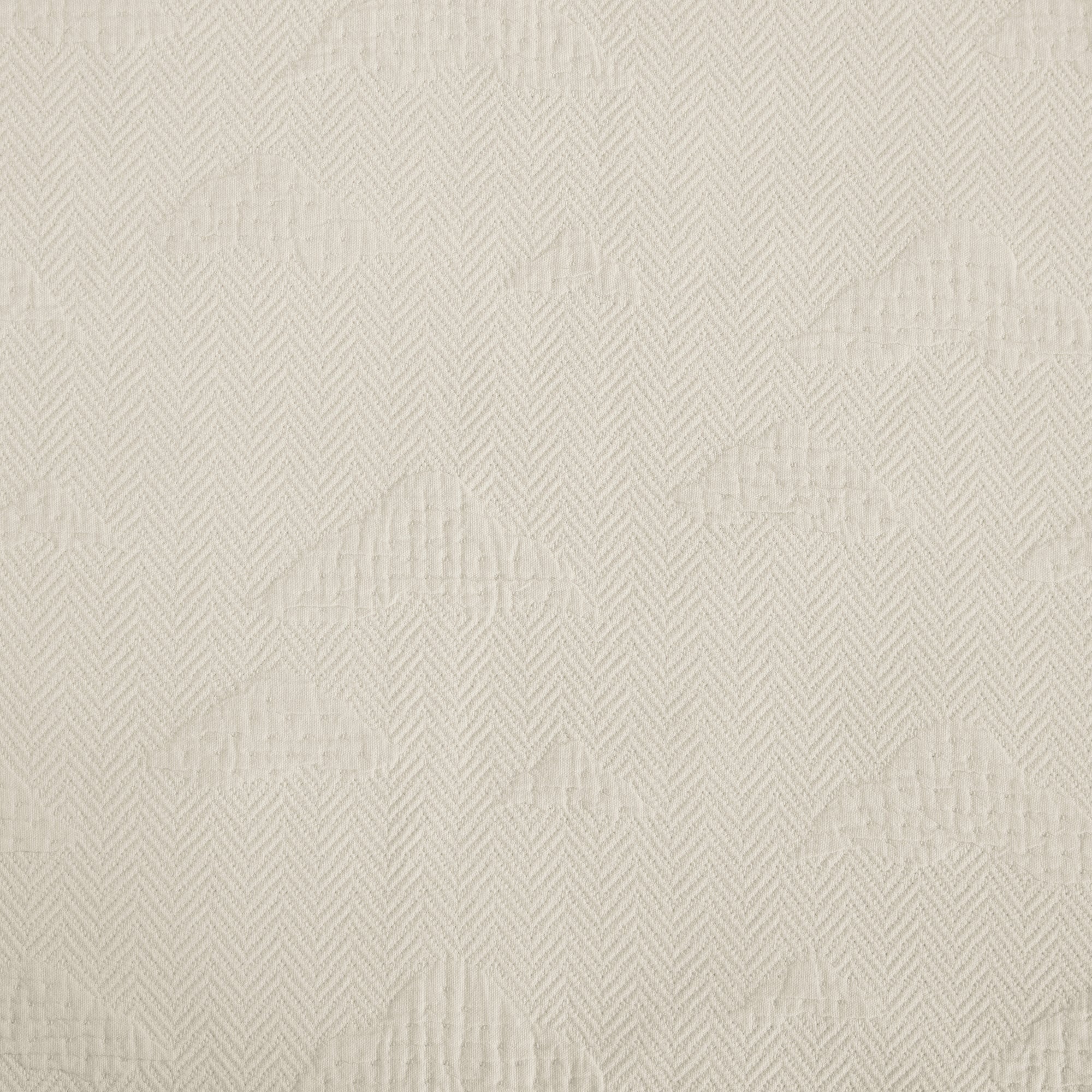 detail of matelasse comforter material neutral western bedding soft cotton textured rustic bedroom decor