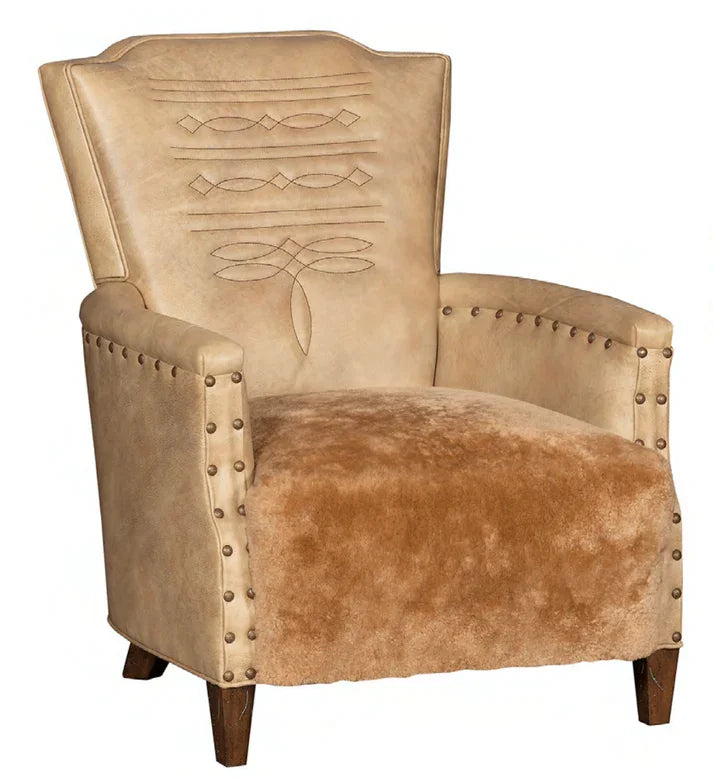 Beige armchair with decorative backrest and studded details on a white background - Your Western Decor