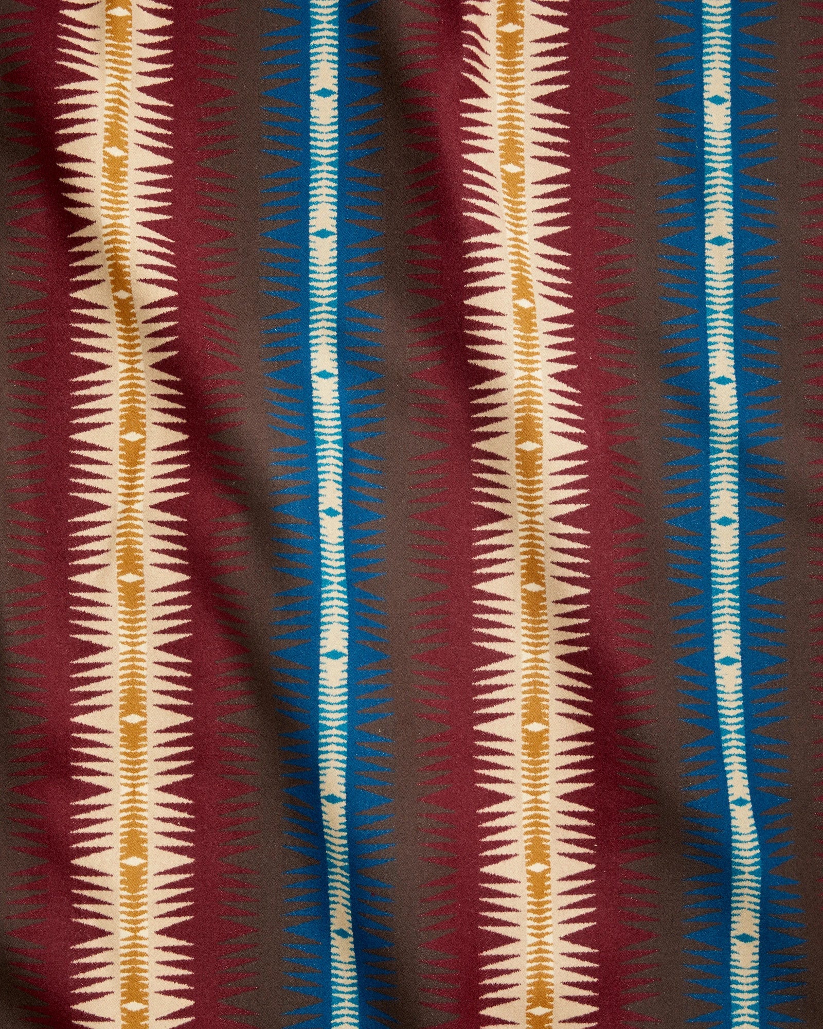 Pendleton Tye River southwestern wool fabric with bold blue, burgundy, ivory, and brown striped geometric pattern, blanket-weight jacquard upholstery fabric