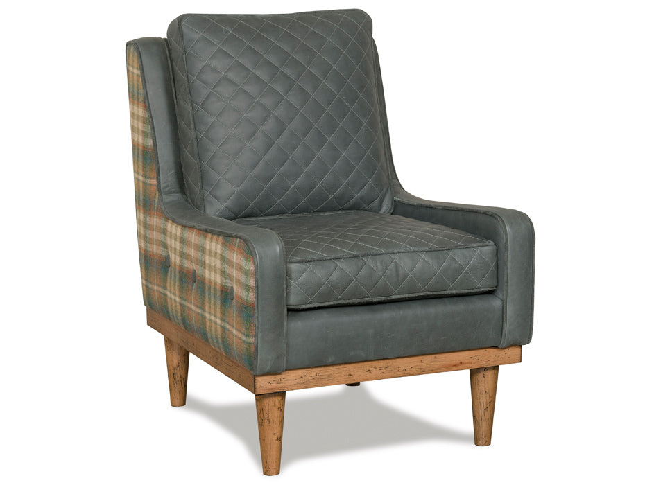 Rustic hunting lodge chair with quilted leather seating