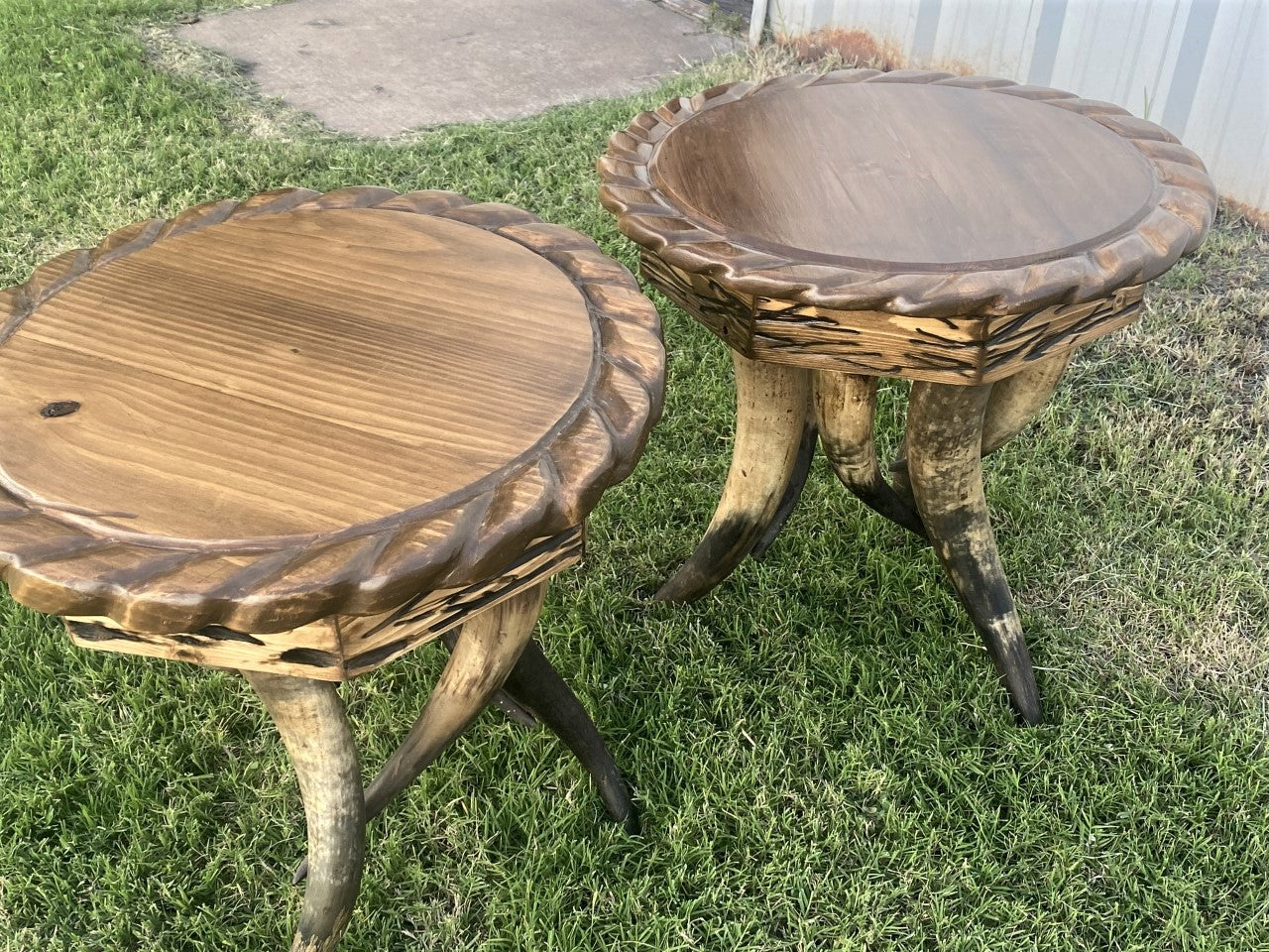 Round hand carved western side tables with steer horn legs