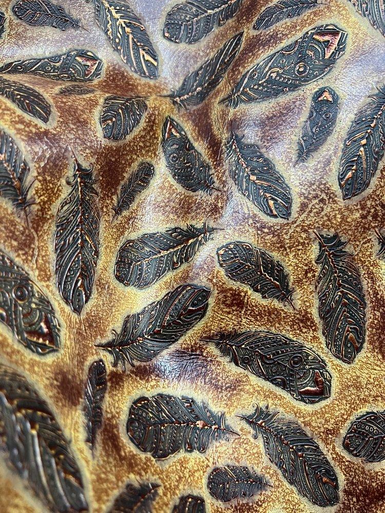 Embossed leather hide with feathers over sepia - Your Western Decor