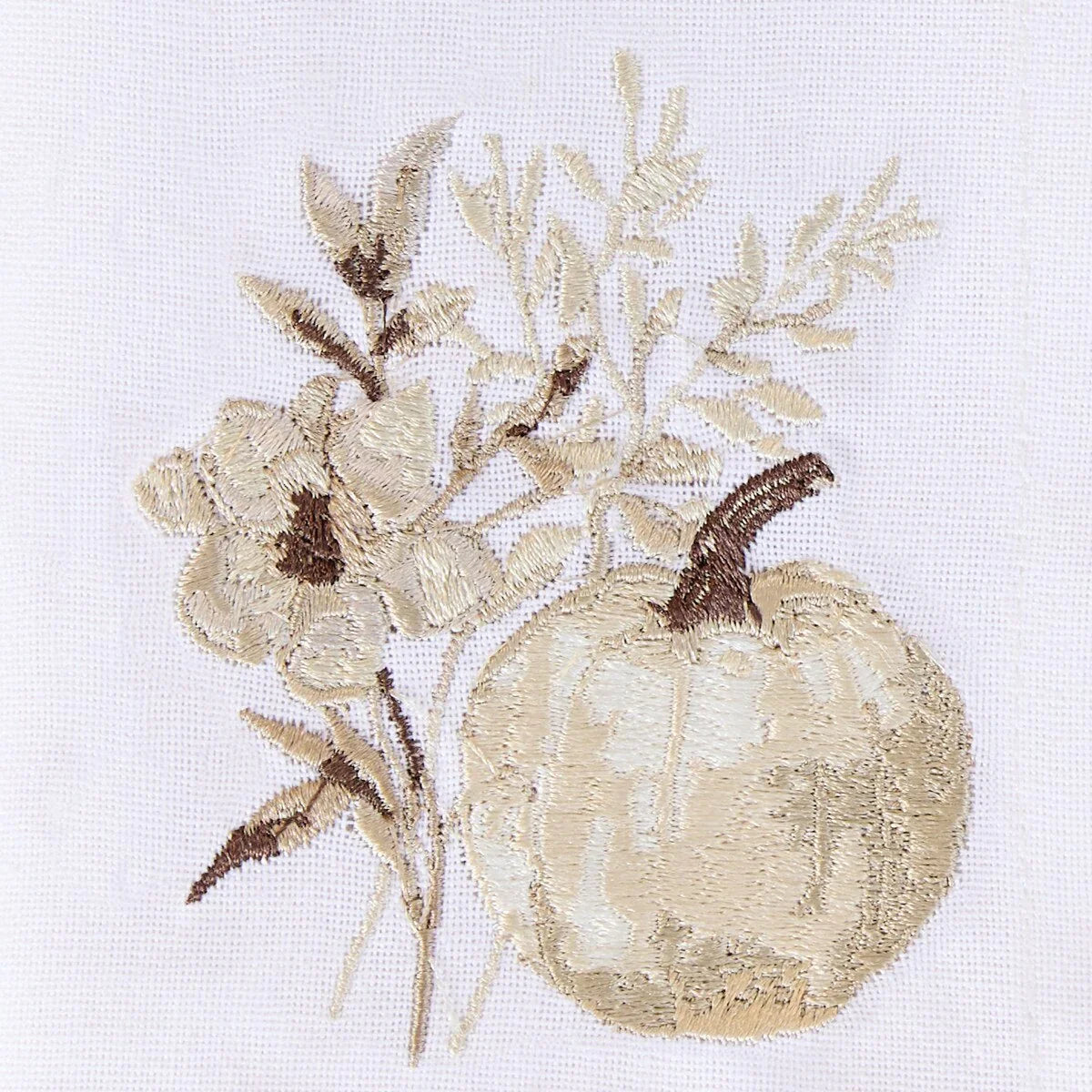 Decorative needlepoint of a pumpkin and flowers on a white cloth napkin - Your Western Decor