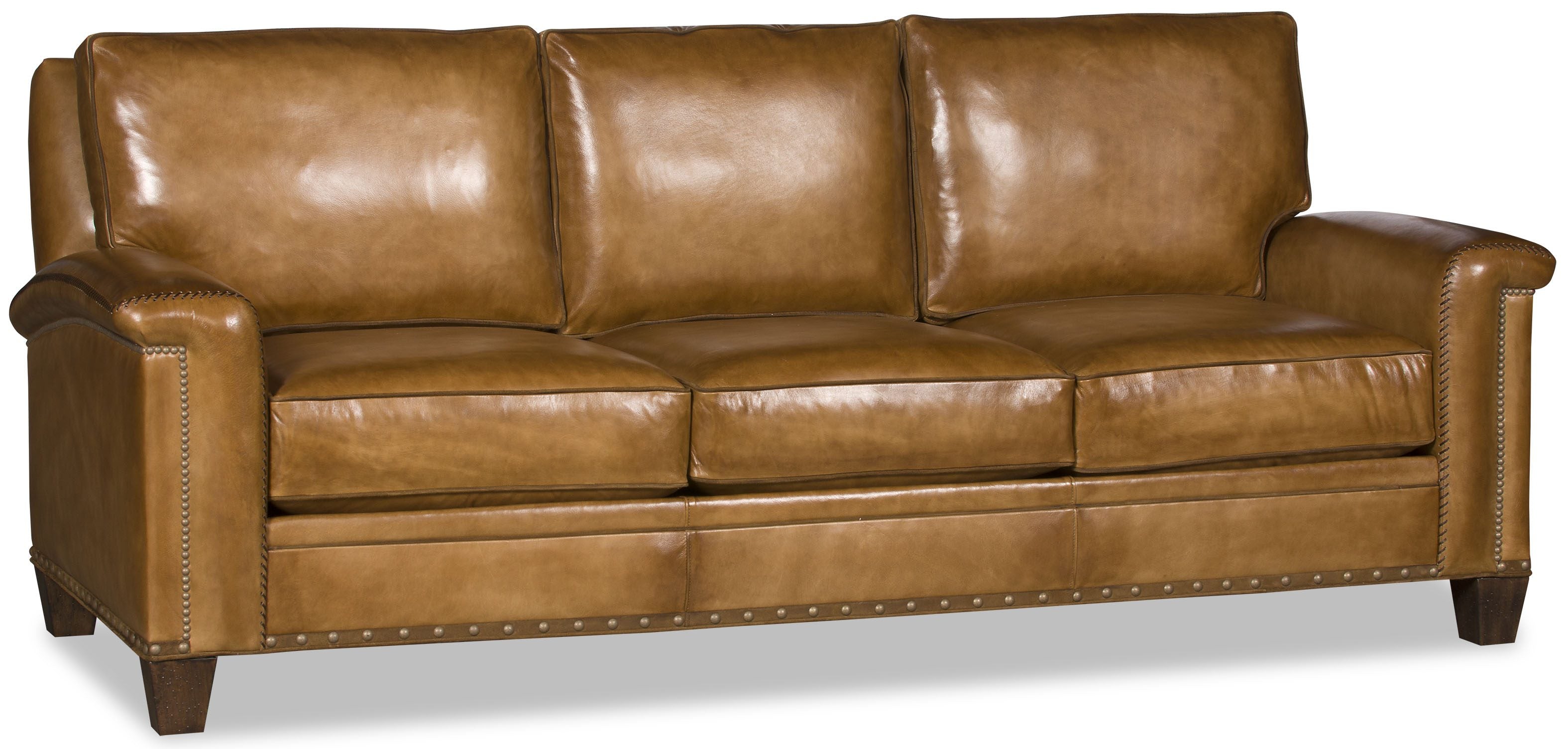Luxury western leather couch handcrafted in North Carolina with warm whiskey leather upholstery, gimp trim, nail trim, and welts