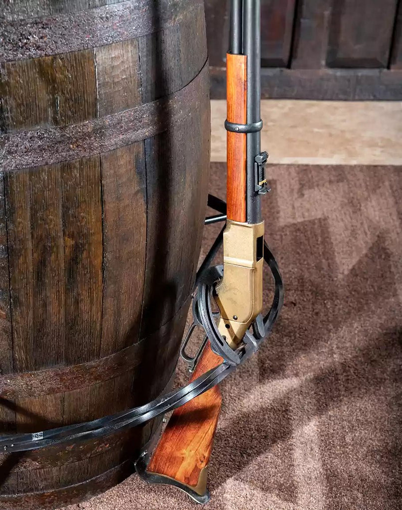 Replica rifle on western whiskey barrel bar table - Your Western Decor