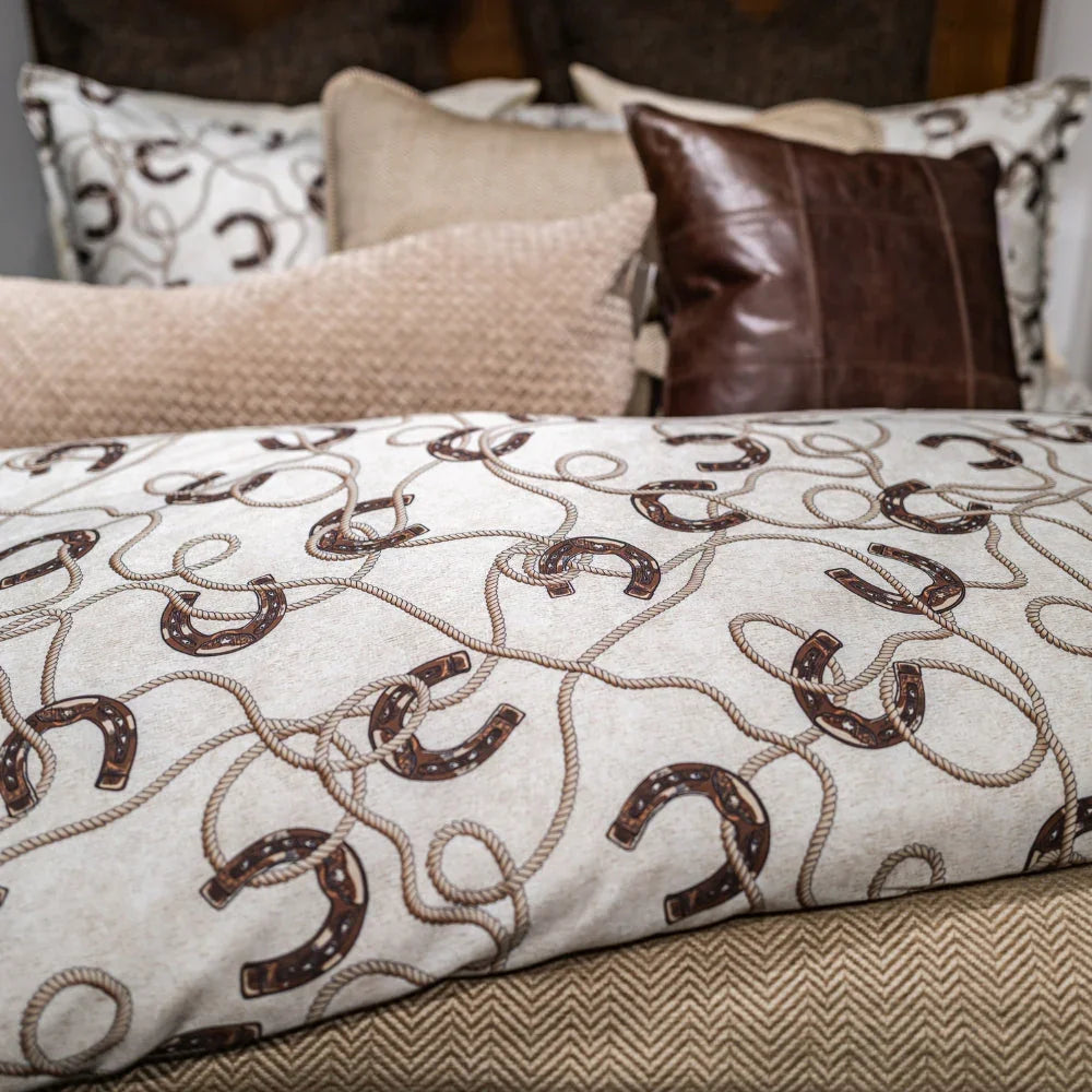 100% cotton duvet and comforter sets featuring brown horse shoes and rope over a cream background - Your Western Decor