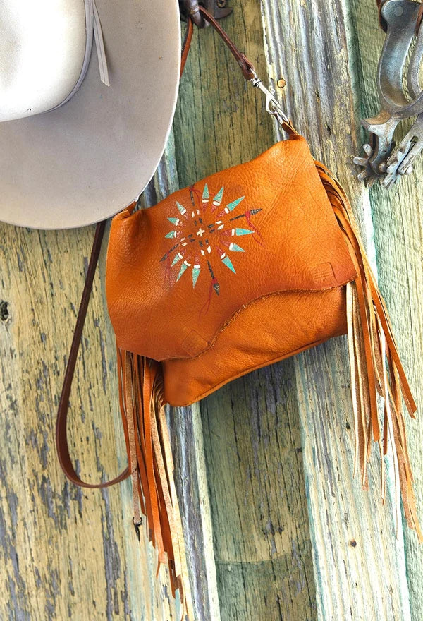 Saddle Arapaho Painted Horizon deerskin leather handbag with hand-painted motif, long fringe and crossbody strap