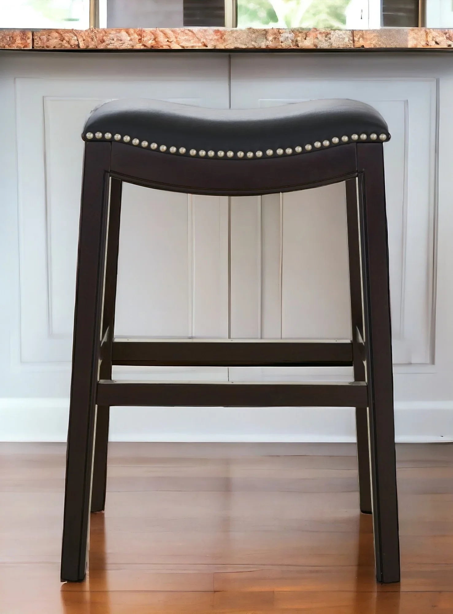 saddle style counter stool in black - Your Western Decor