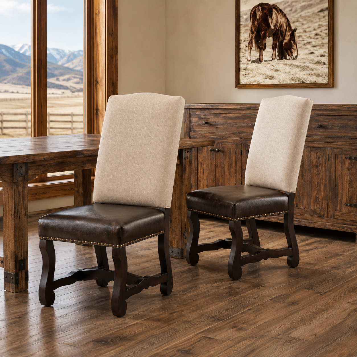 Luxury ranch dining room featuring Sierra linen and leather dining chairs and rustic wood table