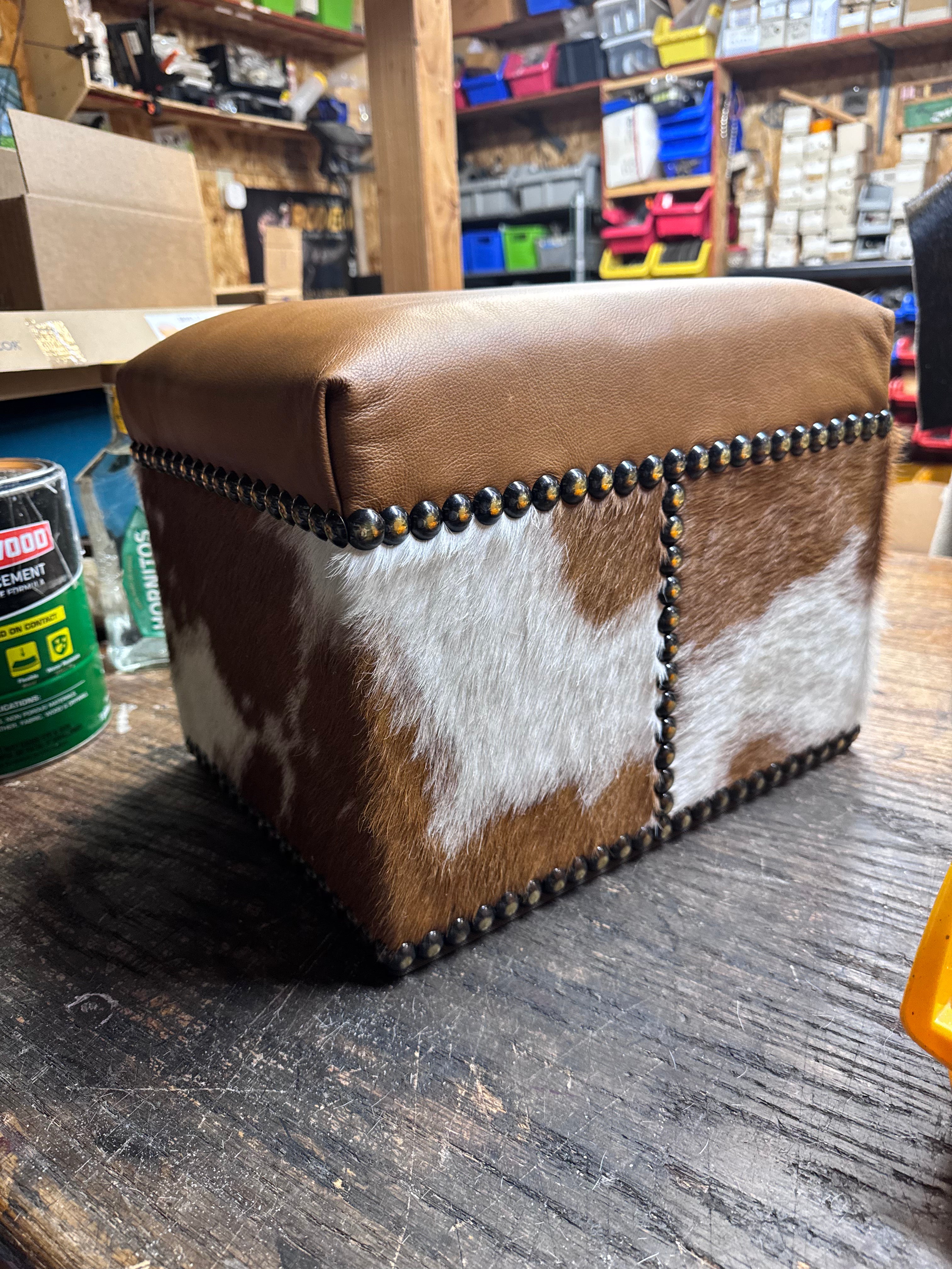 Custom made brown and white cowhide with brown leather top ottoman - Your Western Decor