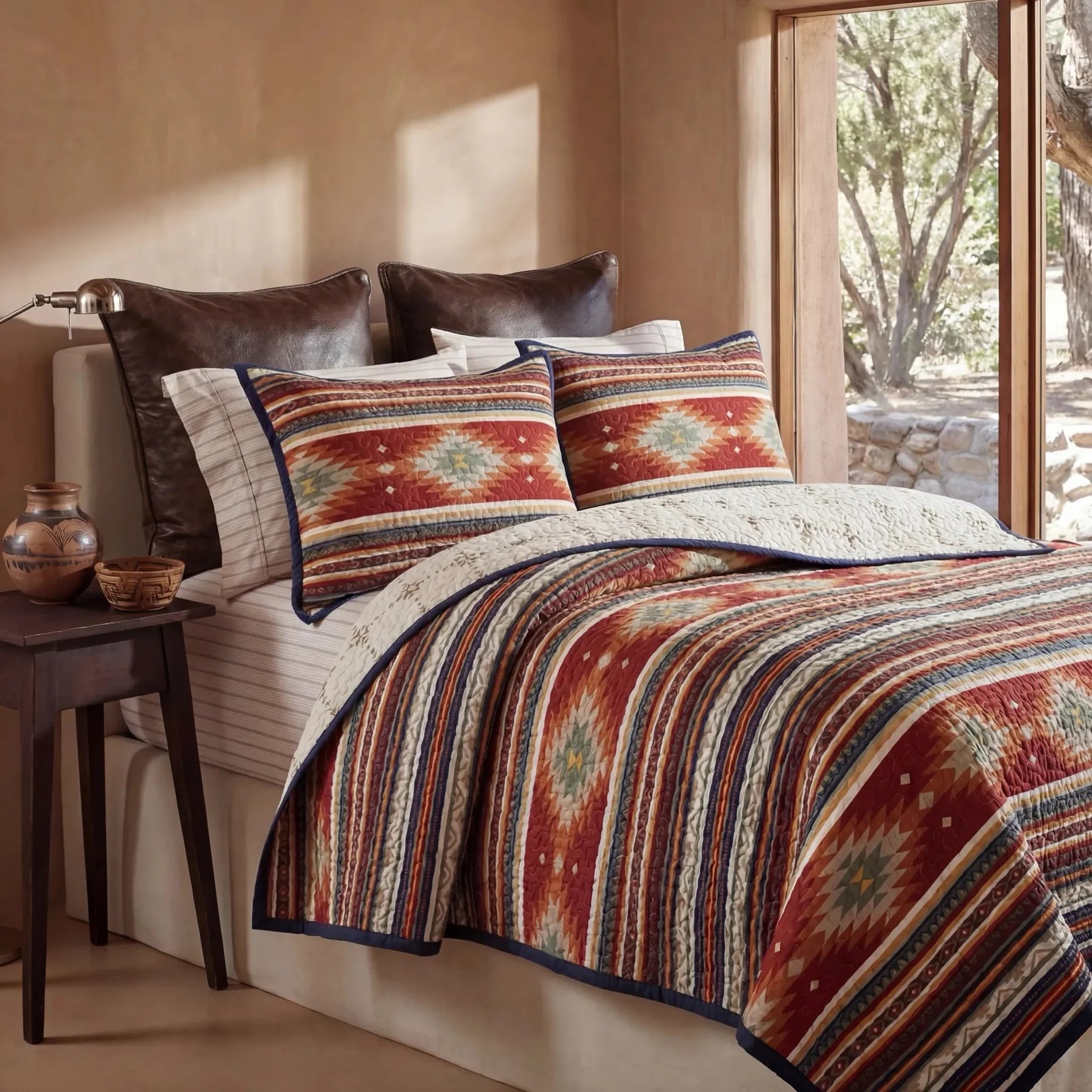 Colorful reversible Southwestern quilt set with faux leather euro shams