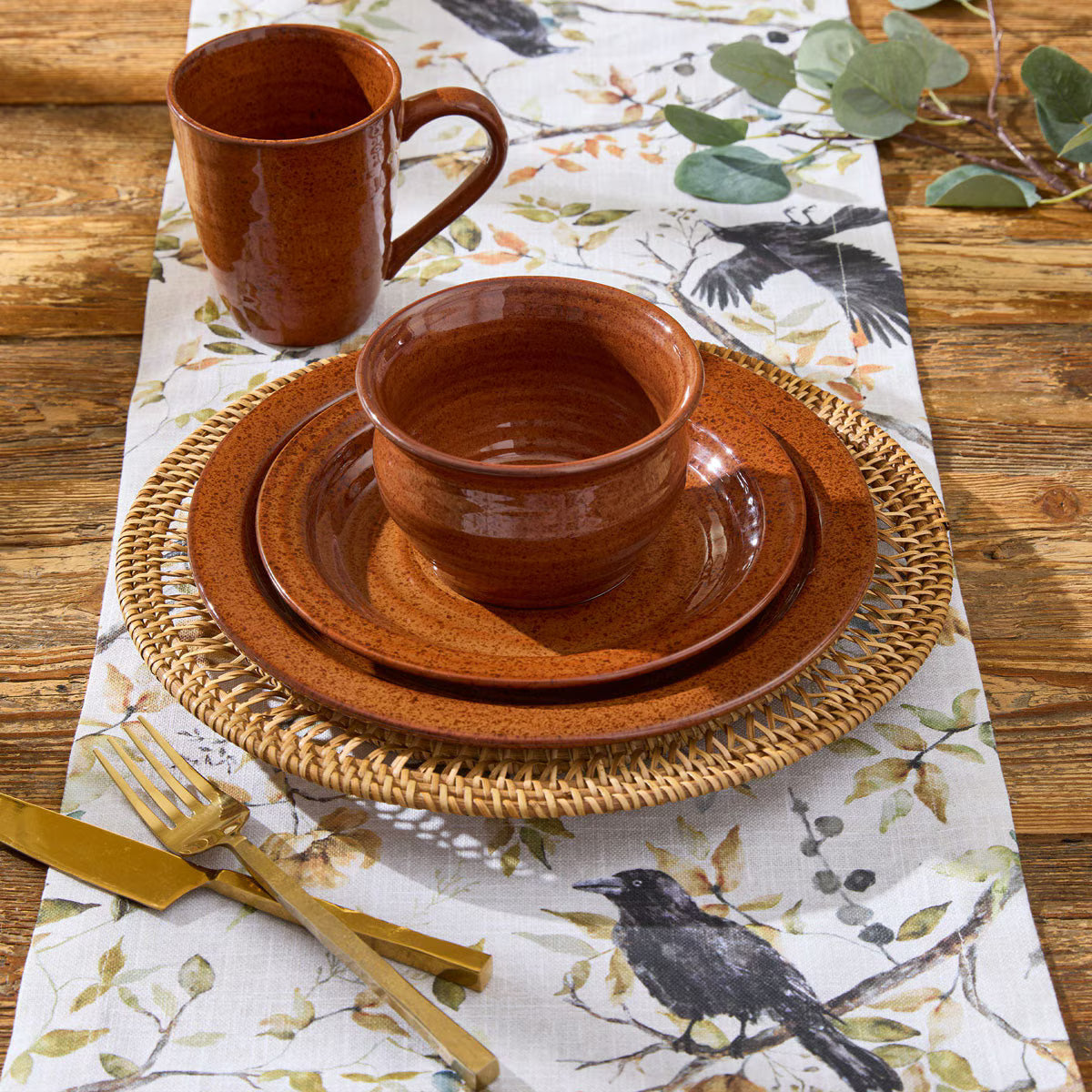 rustic dinnerware set with warm terra cotta glaze