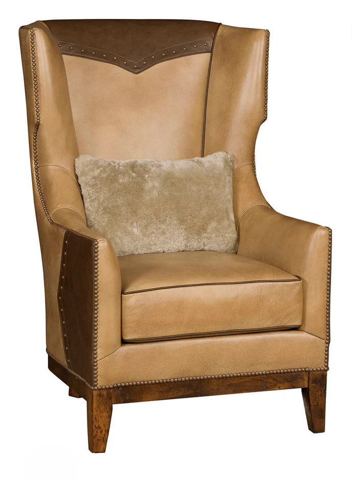 Brown leather wingback chair with a matching pillow on a white background - Your Western Decor