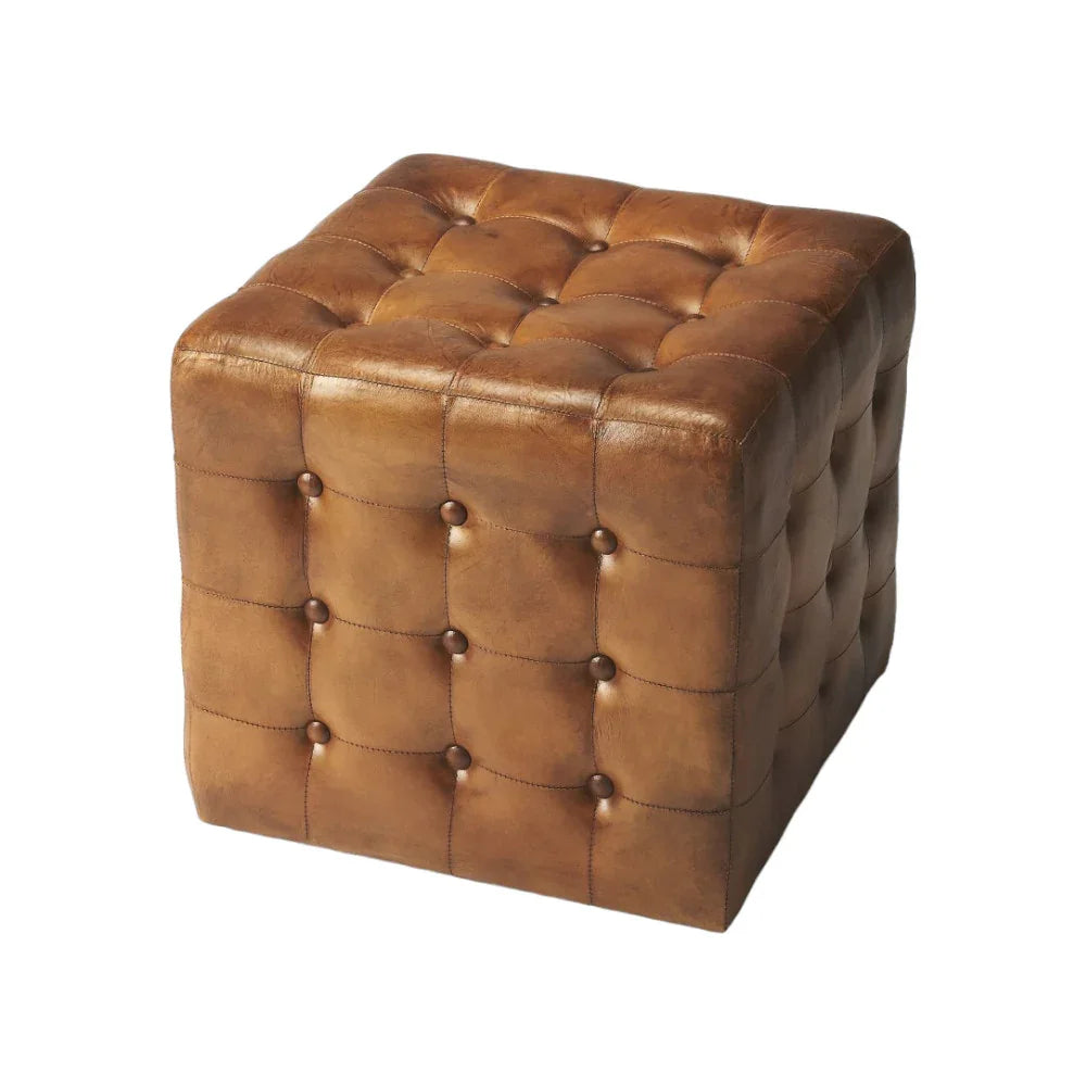 Brown leather ottoman with tufted design on a white background - Your Western Decor