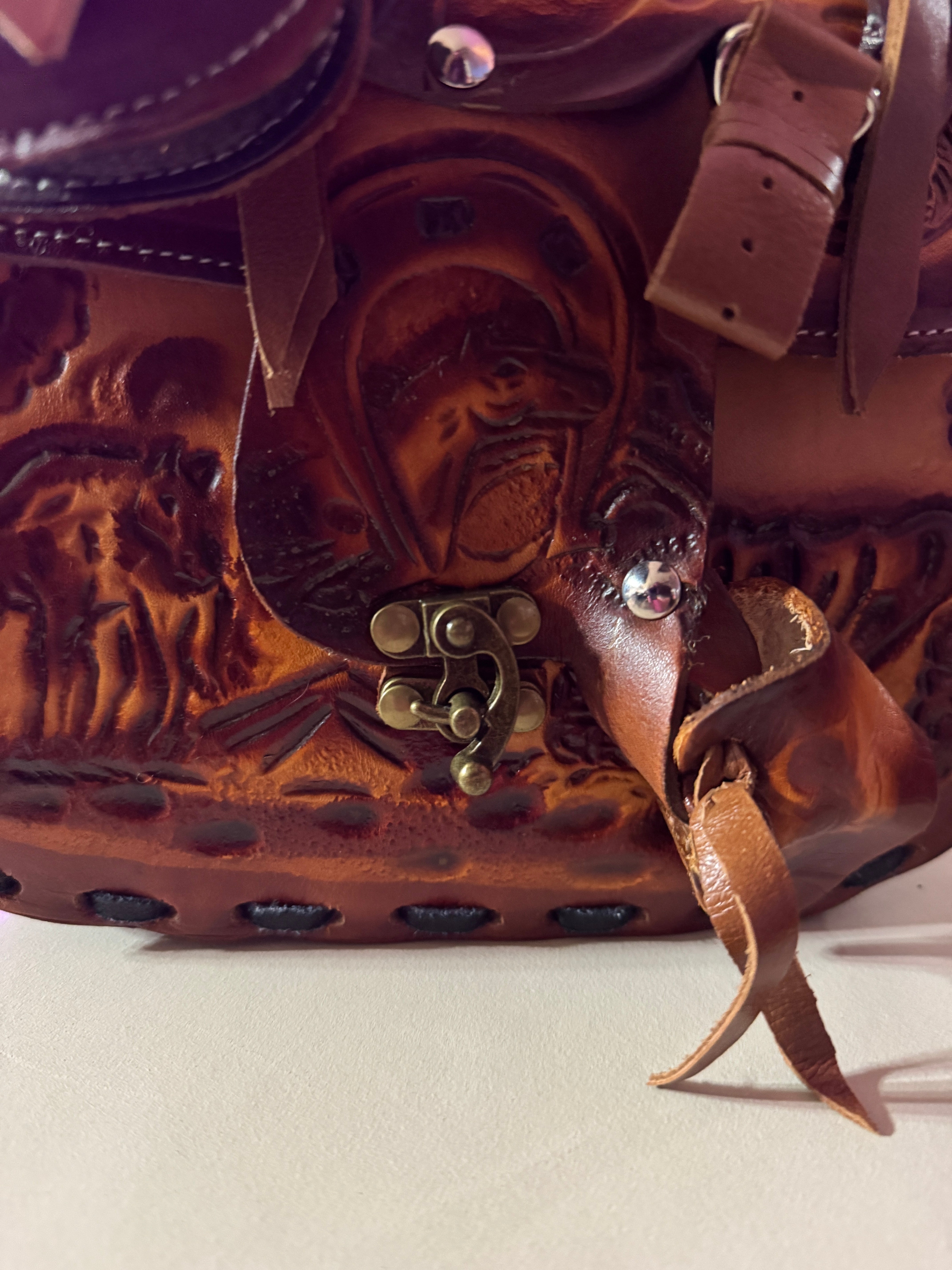 Tooled leather saddle purse detail latch closure - Your Western Decor