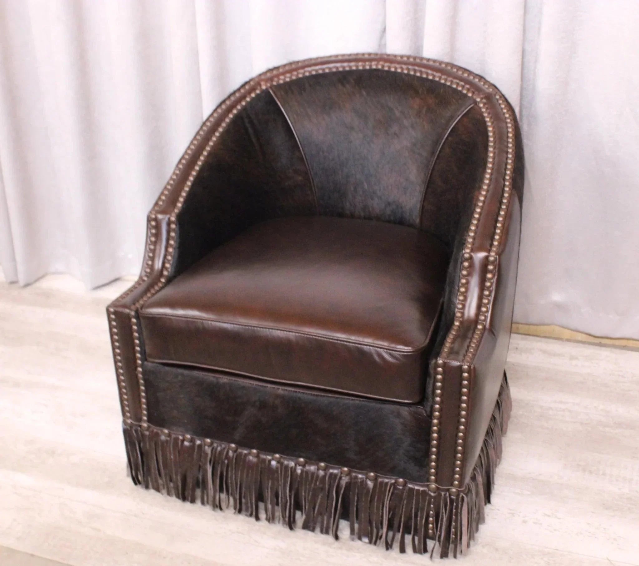 Tulsa King Leather Swivel Chair in cowhide and leather with fringe - Your Western Decor