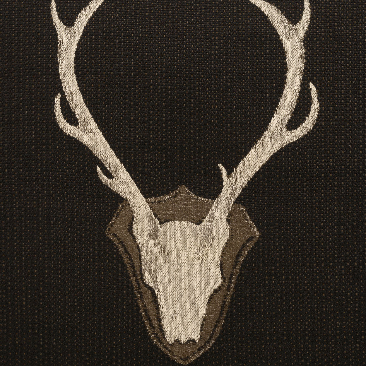 Embroidered design of a deer skull with antlers on a black background