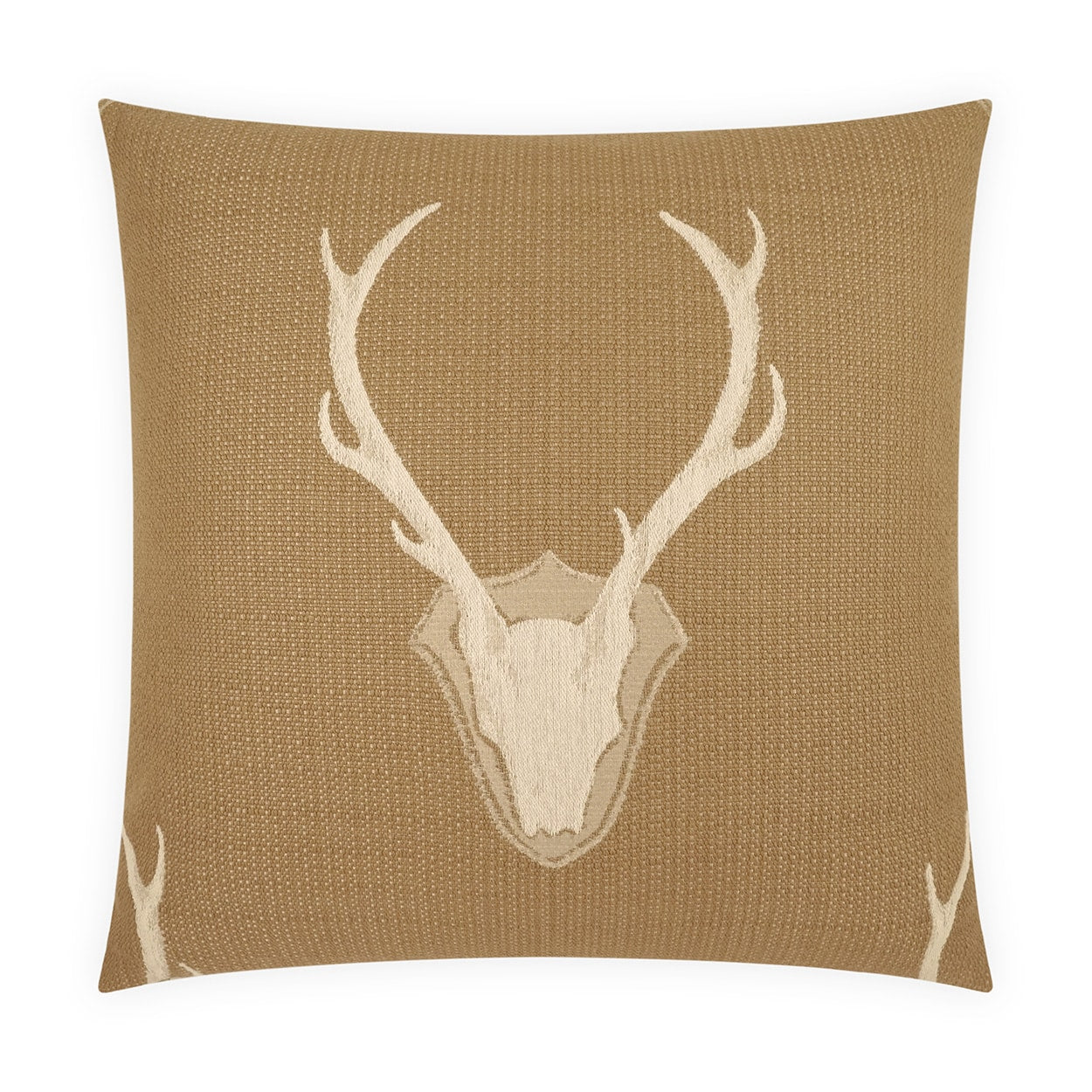 Decorative pillow with deer skull design on a beige background