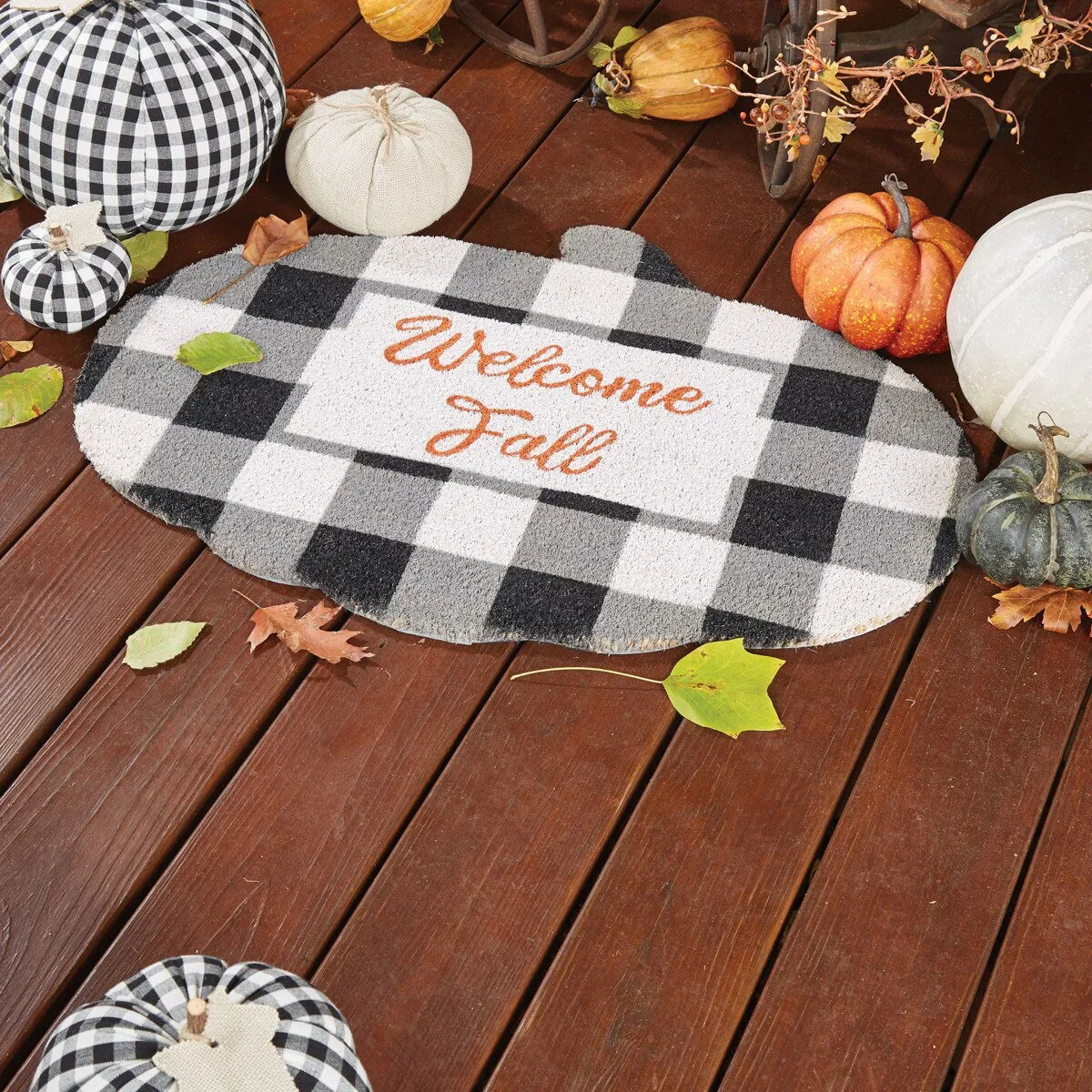 Checkered doormat with 'Welcome Fall' text on a wooden floor with pumpkins and leaves - Your Western Decor