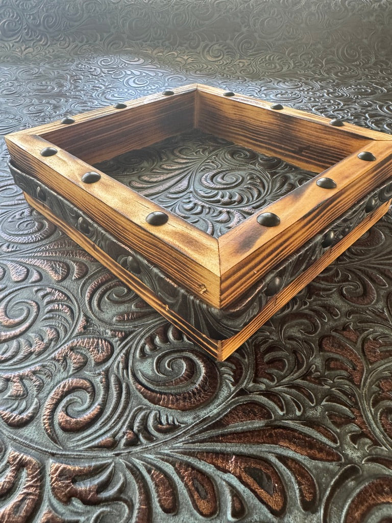 Back view of handmade coaster display box with embossed leather inside and handmade embossed leather belt