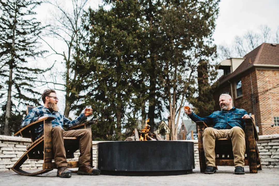 American made Distillin' Chillin' Adirondack Chairs around the fire pit, made from Whiskey barrels - Your Western Decor