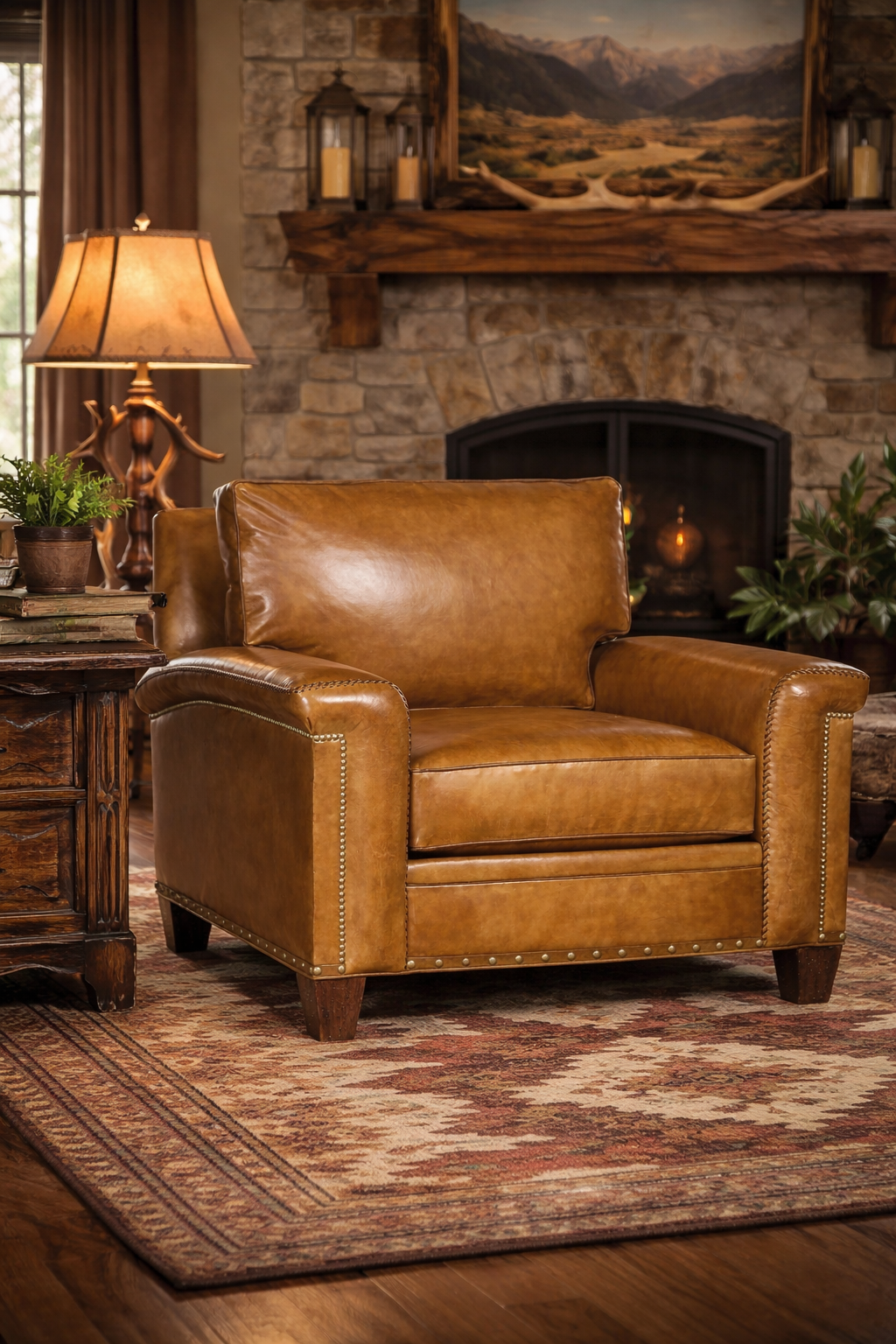 Brown leather Whiskey Range Leather Western armchair in a cozy living room with stone fireplace and rustic decor