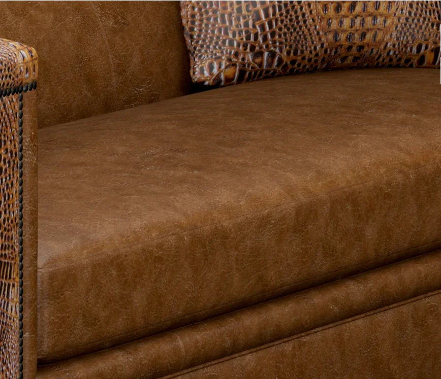 Brown leather sofa with textured armrests - Your Western Decor