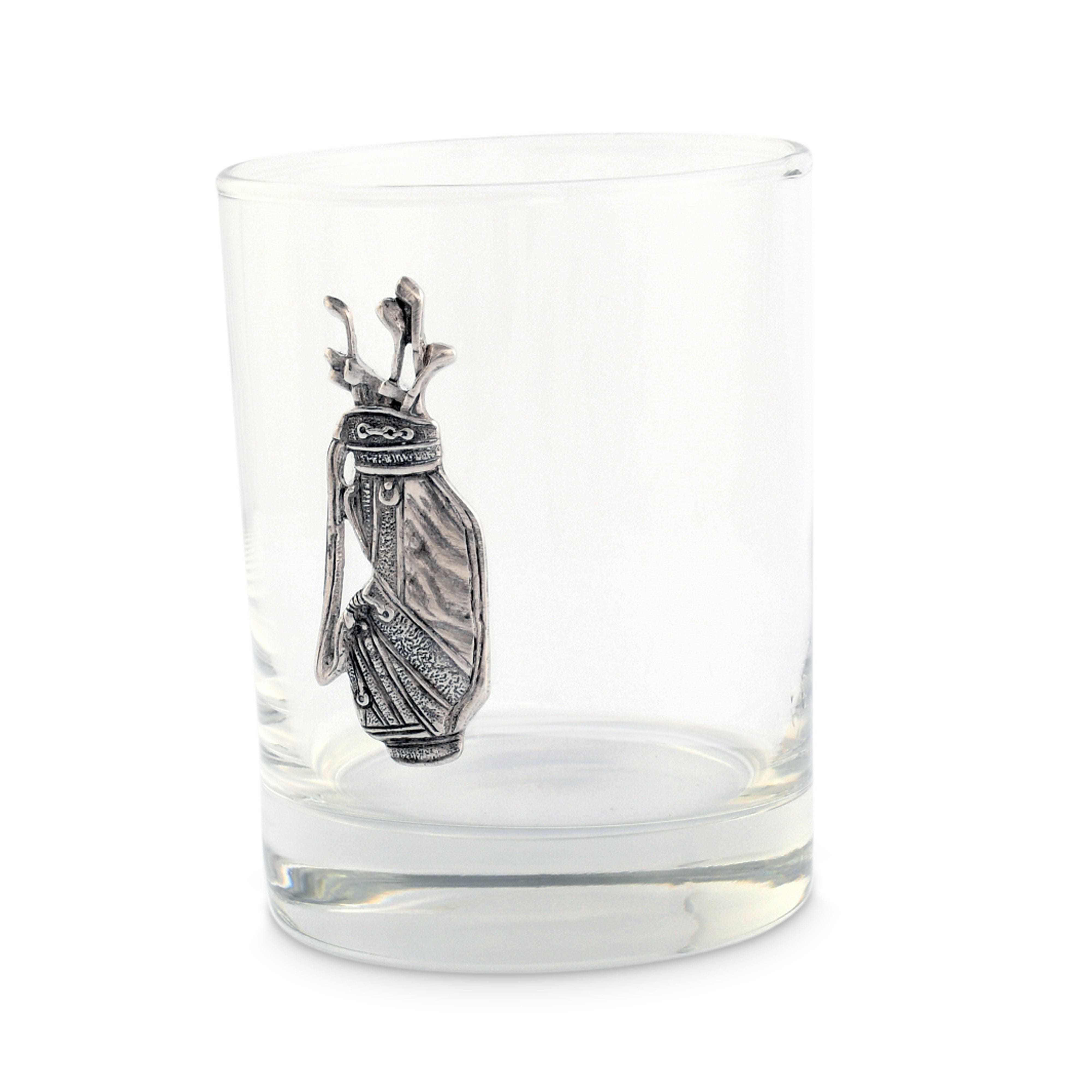 Clear glass with a silver golf bag charm on a white background