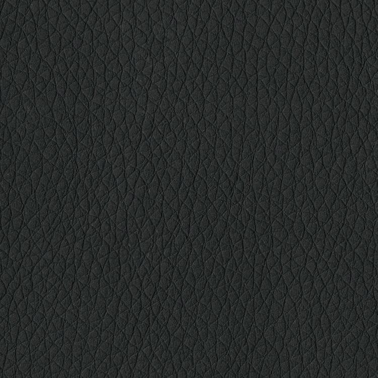 Close-up of black faux leather fabric with a textured pattern - Your Western Decor