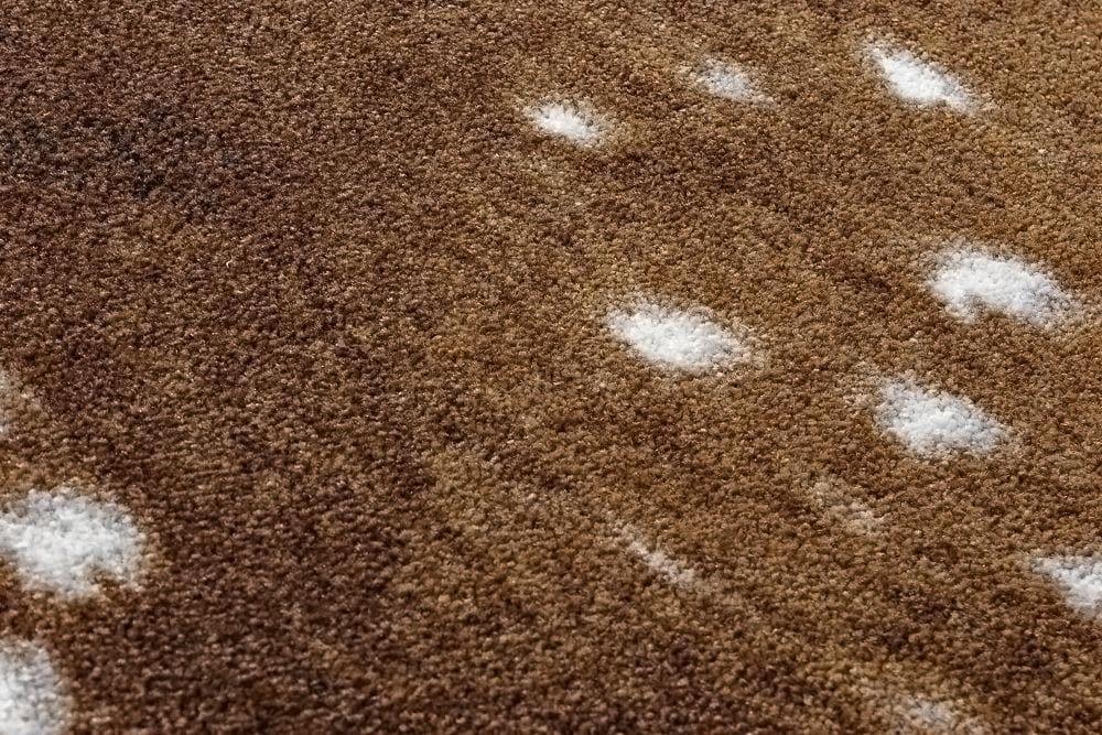 XL faux axis hide area rug detail - Made in the USA - Your Western Decor