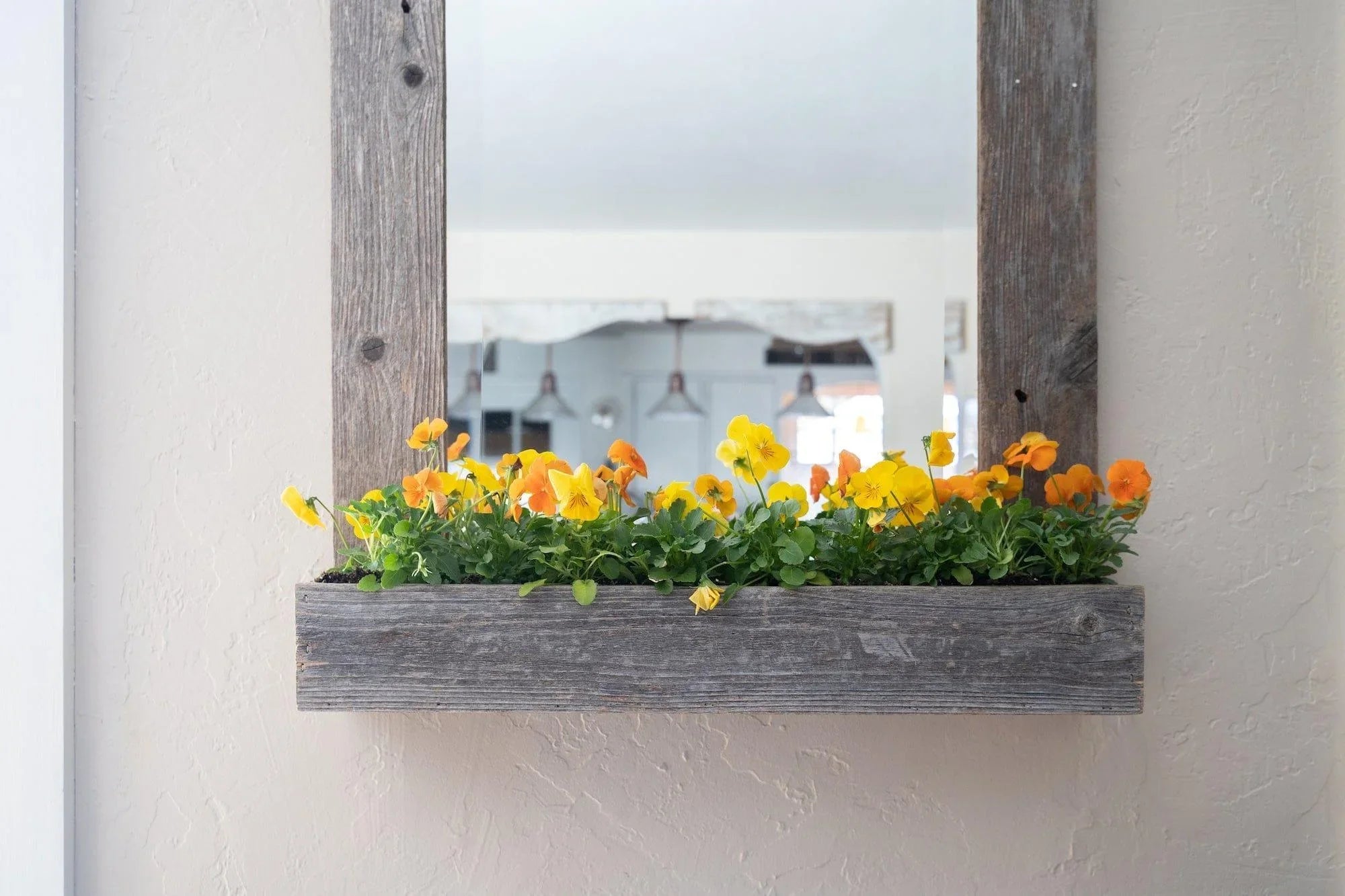 Barnwood framed mirror with plant box. Your Western Decor