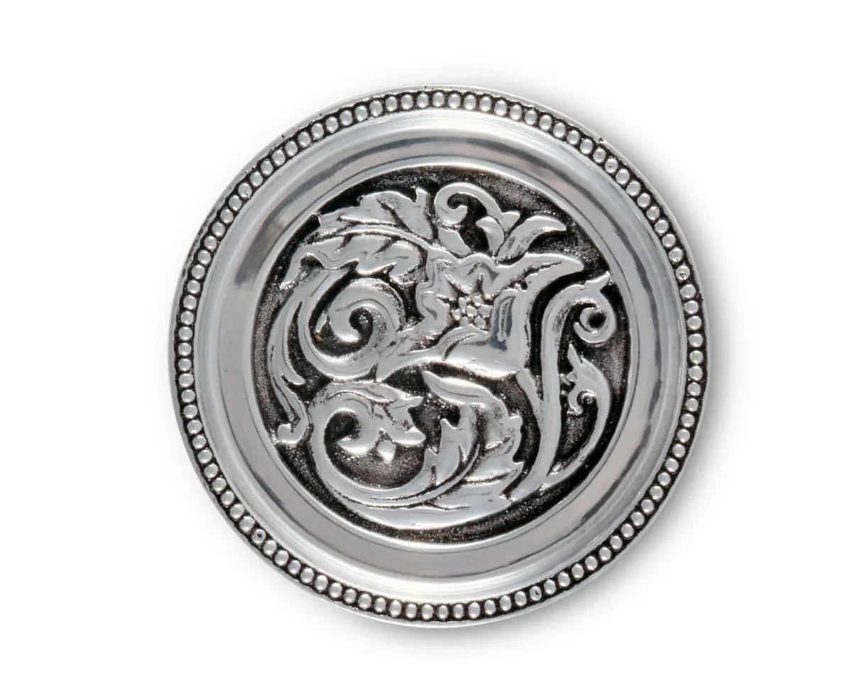 Round aluminum coaster set with cork bottoms. Hammered cactus flower and concho design. Your Western Decor