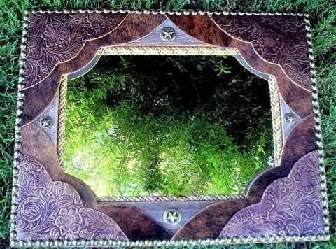 Handmade rectangle barnwood wall mirror accented with embossed leather and brindle cowhide with star conchos and continuous nailhead tacking - Handmade in Arizona, USA - Your Western Decor