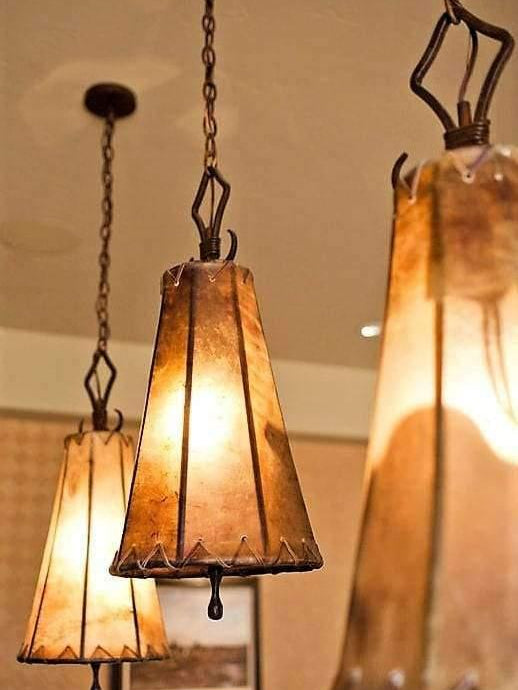 Rustic rawhide pendant lights. Custom made in the USA. Your Western Decor