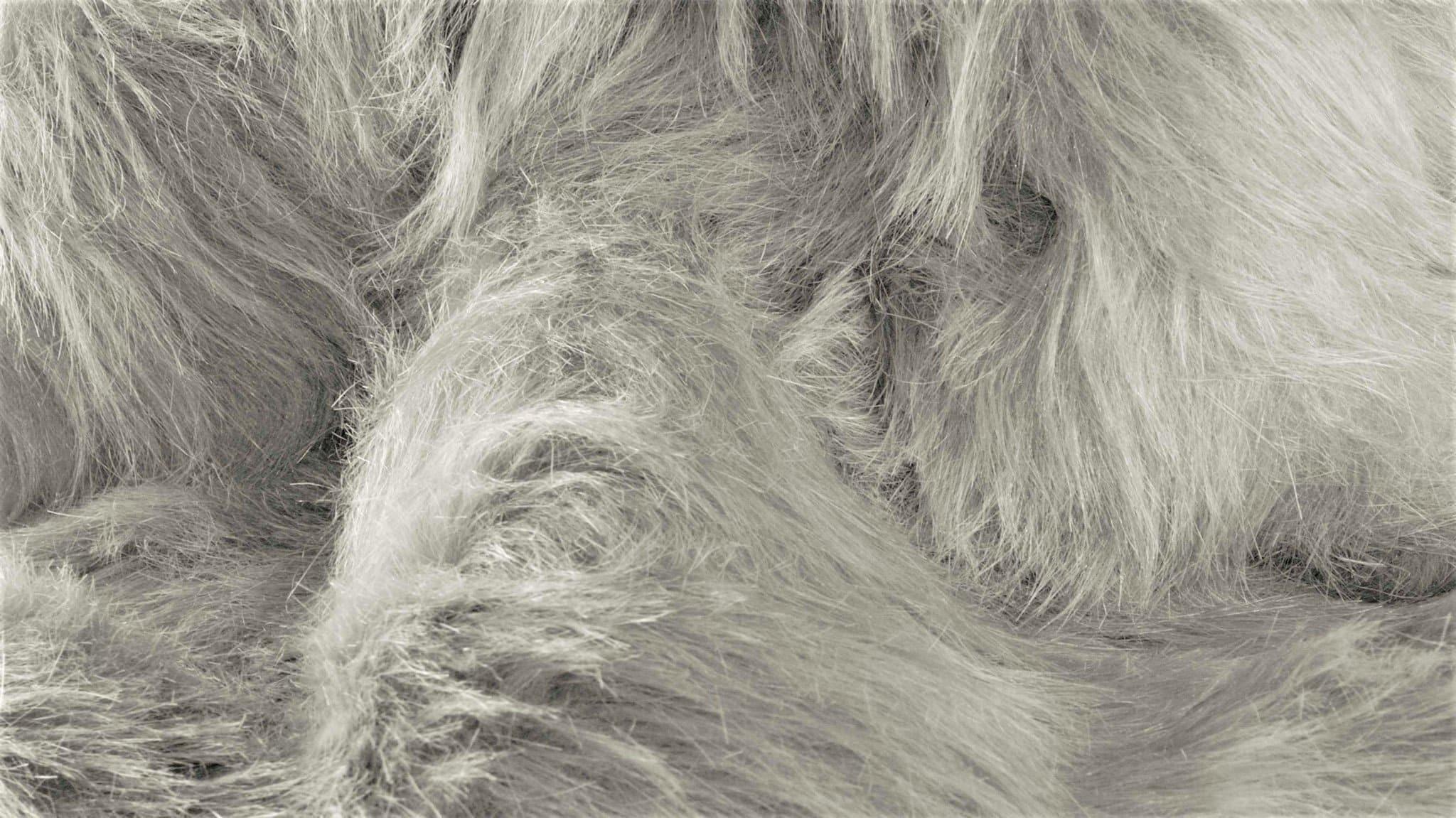 Grey faux sheepskin rug detail - Your Western Decor