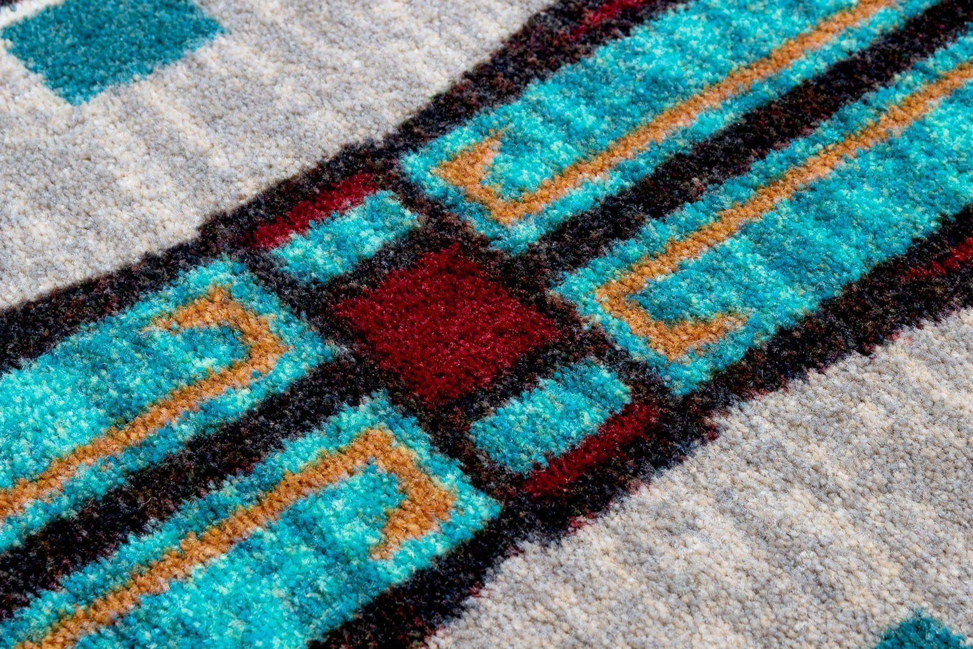 Carpet detail on Horse Thieves red and turquoise area rug made in the USA - Your Western Decor