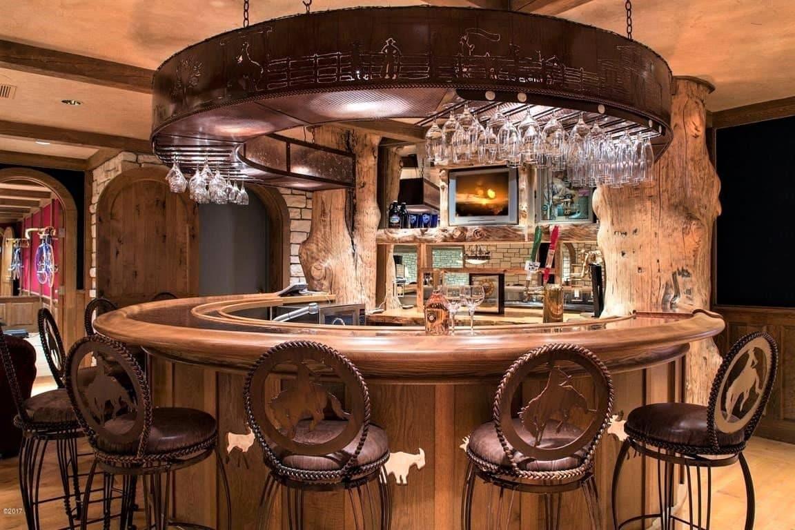 Hand forged and braided western bar stools. Overhead iron bar canopy. Made in the USA. Your Western Decor, LLC