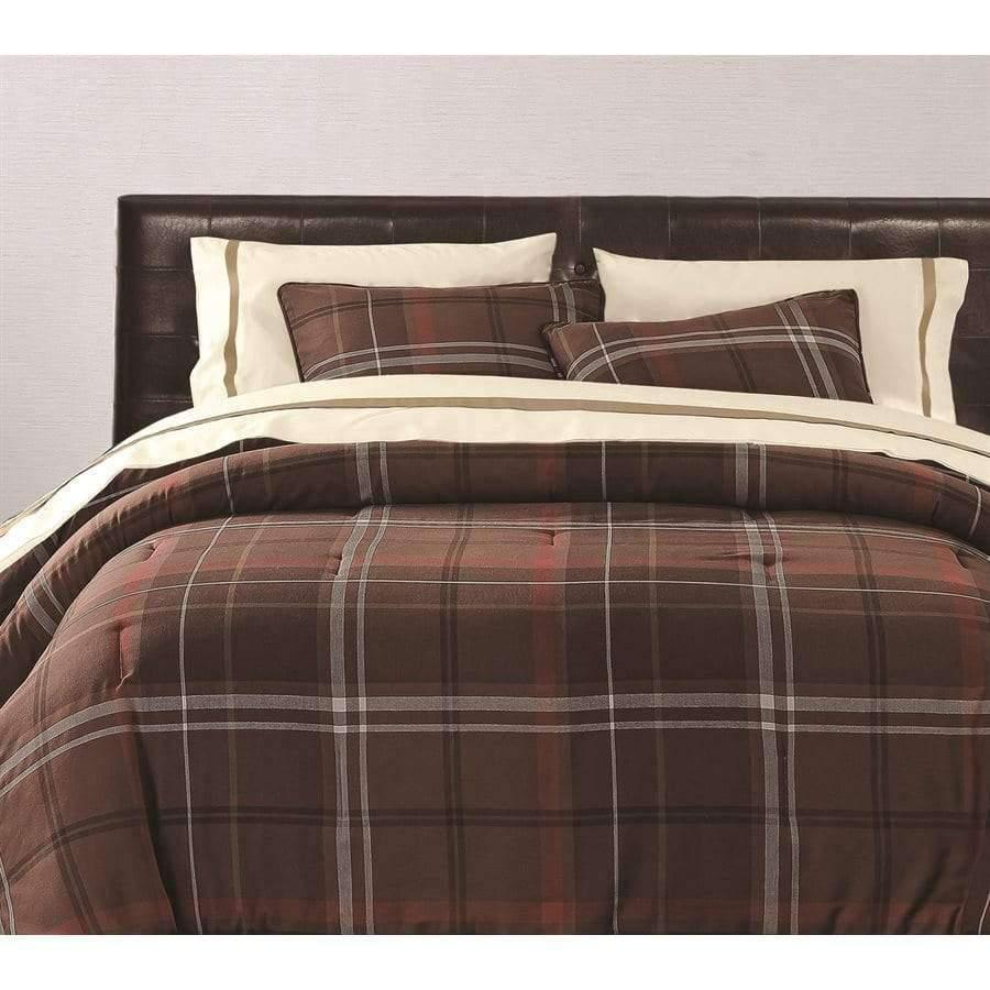 Brown lodge plaid comforter set styled in a luxury rustic resort bedroom with leather headboard